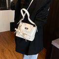Cartera mini de mujer en color blanco, ideal para el uso diario