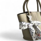 Cartera gris topo cálido